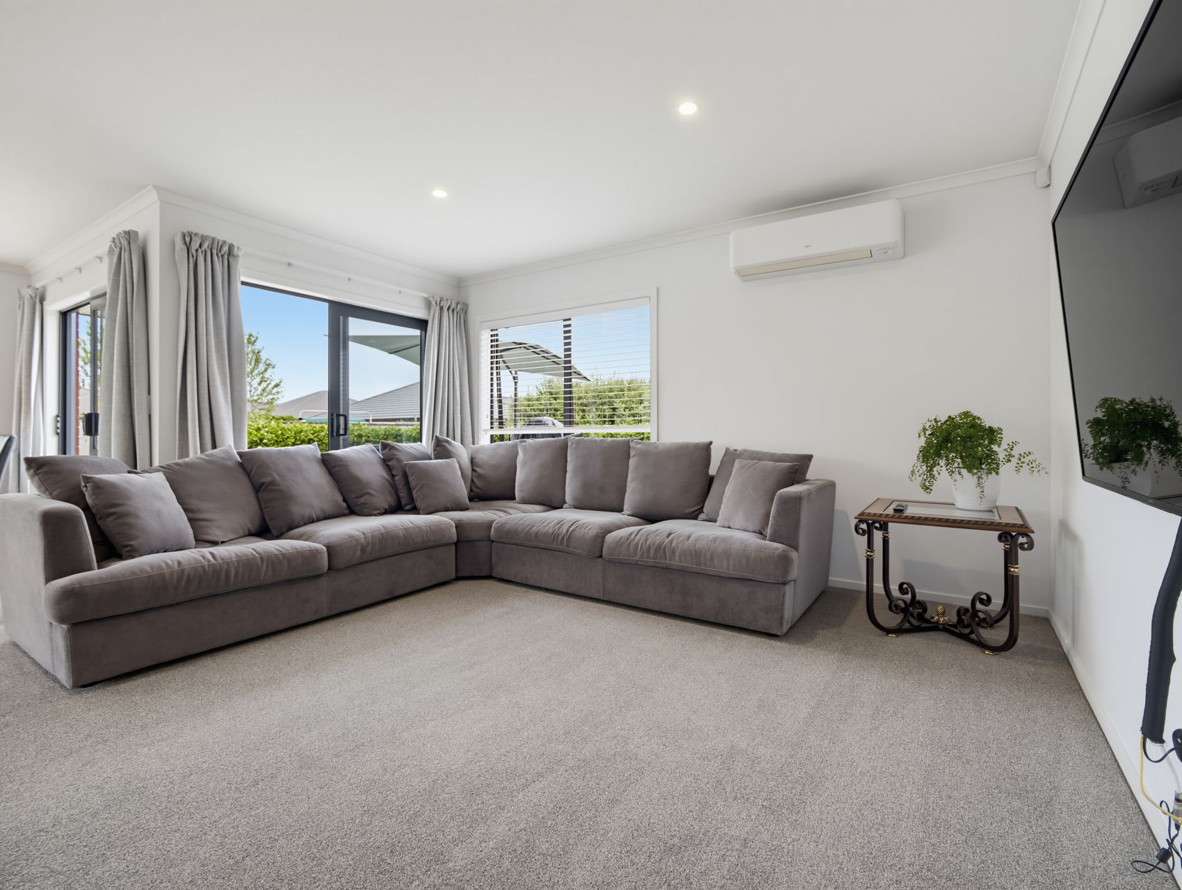 Sunlit Family Living with Deckside Appeal 3