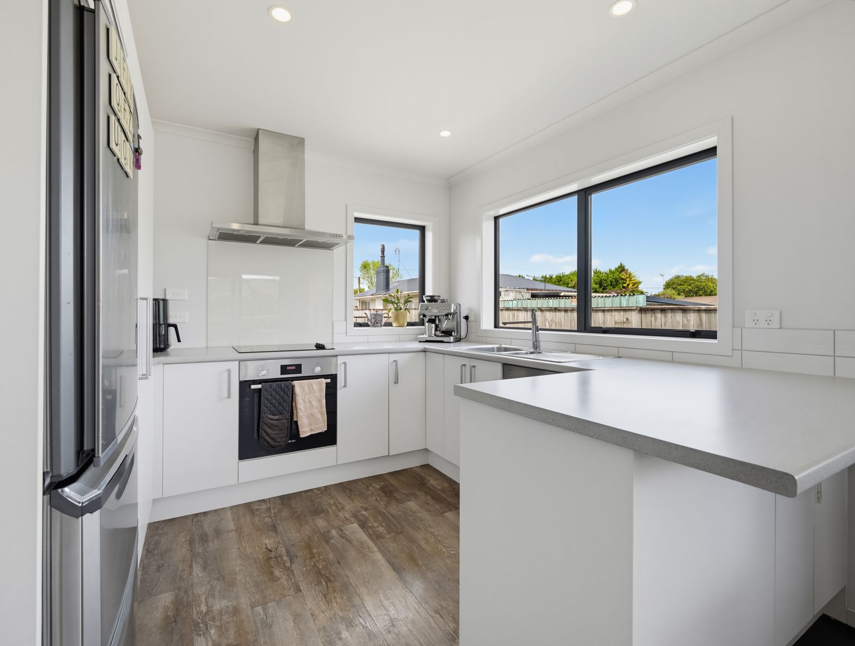Sunlit Family Living with Deckside Appeal 4